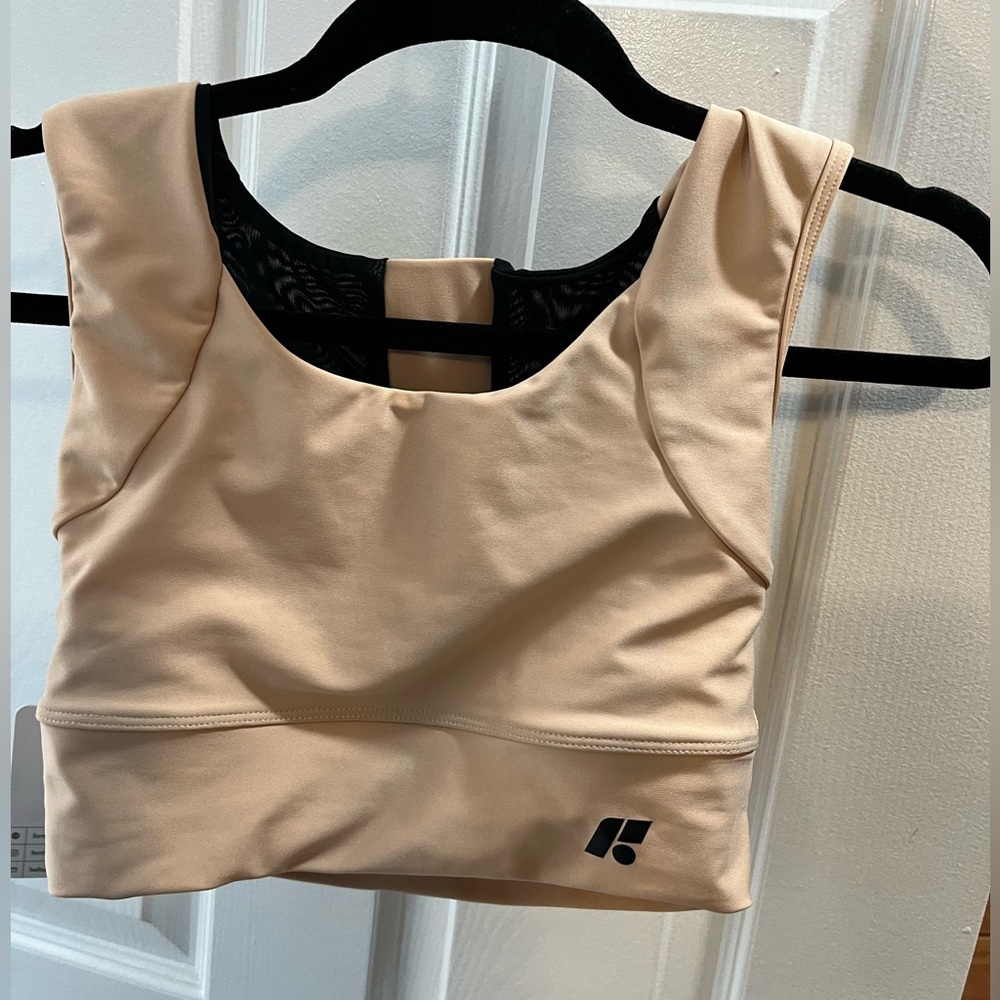 Forme bra. Size Large. Color beige. As seen on Taylor swift. Helps with posture.